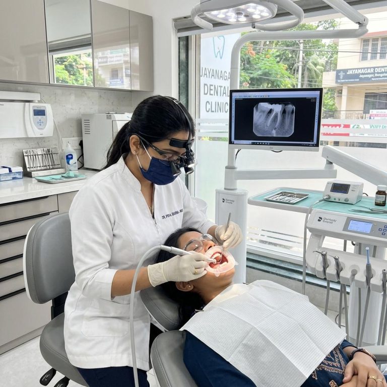 Dentist performing root canal treatment in modern dental clinic in Jayanagar Bengaluru